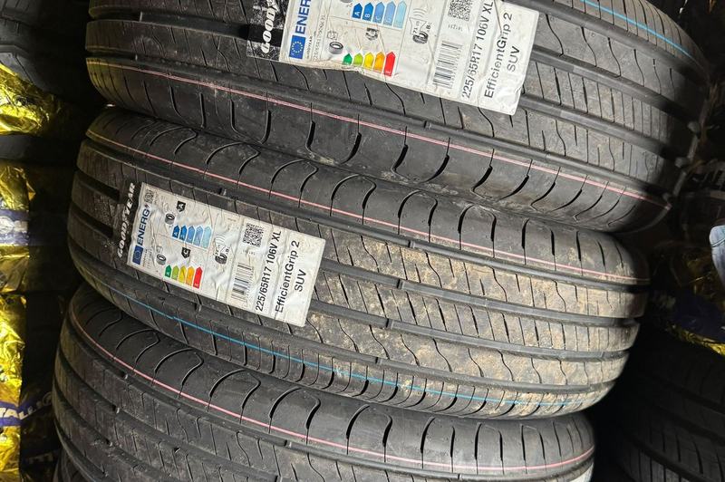 Stack of new Goodyear EfficientGrip SUV tyres with EU tyre labels