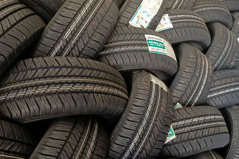 Pile of new Bridgestone Dueler H/T tyres of the same size
